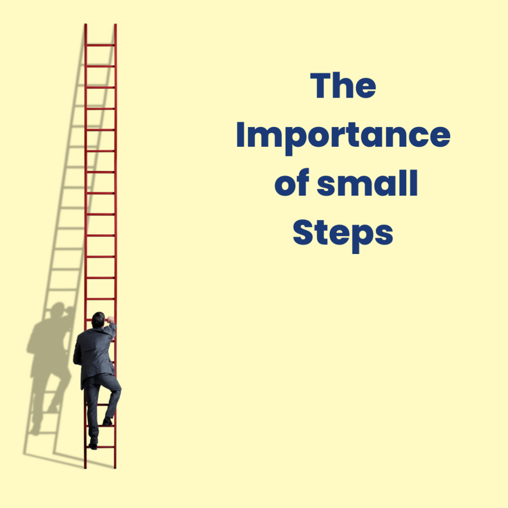 A male in business attire climbing a ladder with the quote "The importance of small steps."