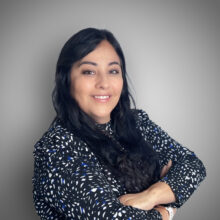 Gerri Dominguez Hispanic woman in black and white pattern shirt