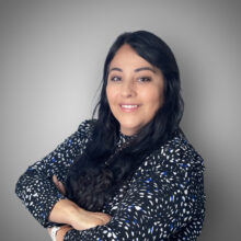 Gerri Dominguez Hispanic woman in black and white pattern shirt