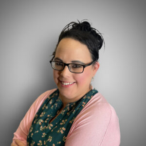 Maria Perez Hispanic woman in a pink sweater